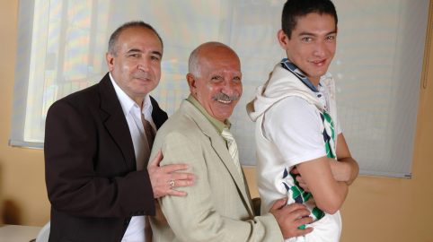 Photo of Alain enjoys two daddies